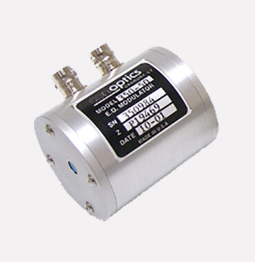 Conoptics phase modulator, cylindrical steel body with two SMA drive connectors and a serial number plate