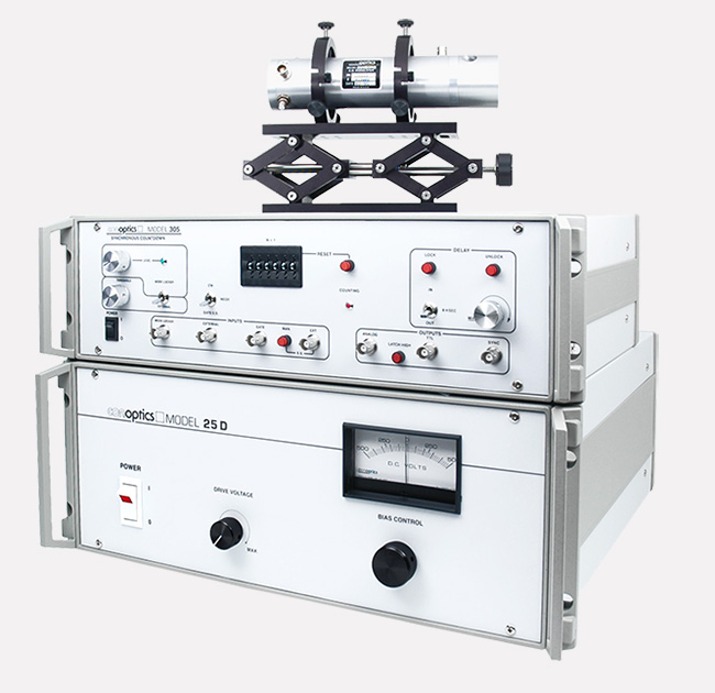 Conoptics laser pulse selection system: Model 305 synchronous countdown and Model 25D driver with a modulator above